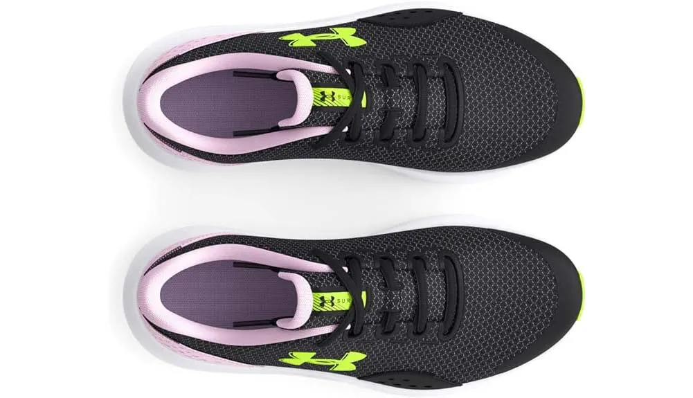 UA Girls Surge 4 in Black by Under Armour